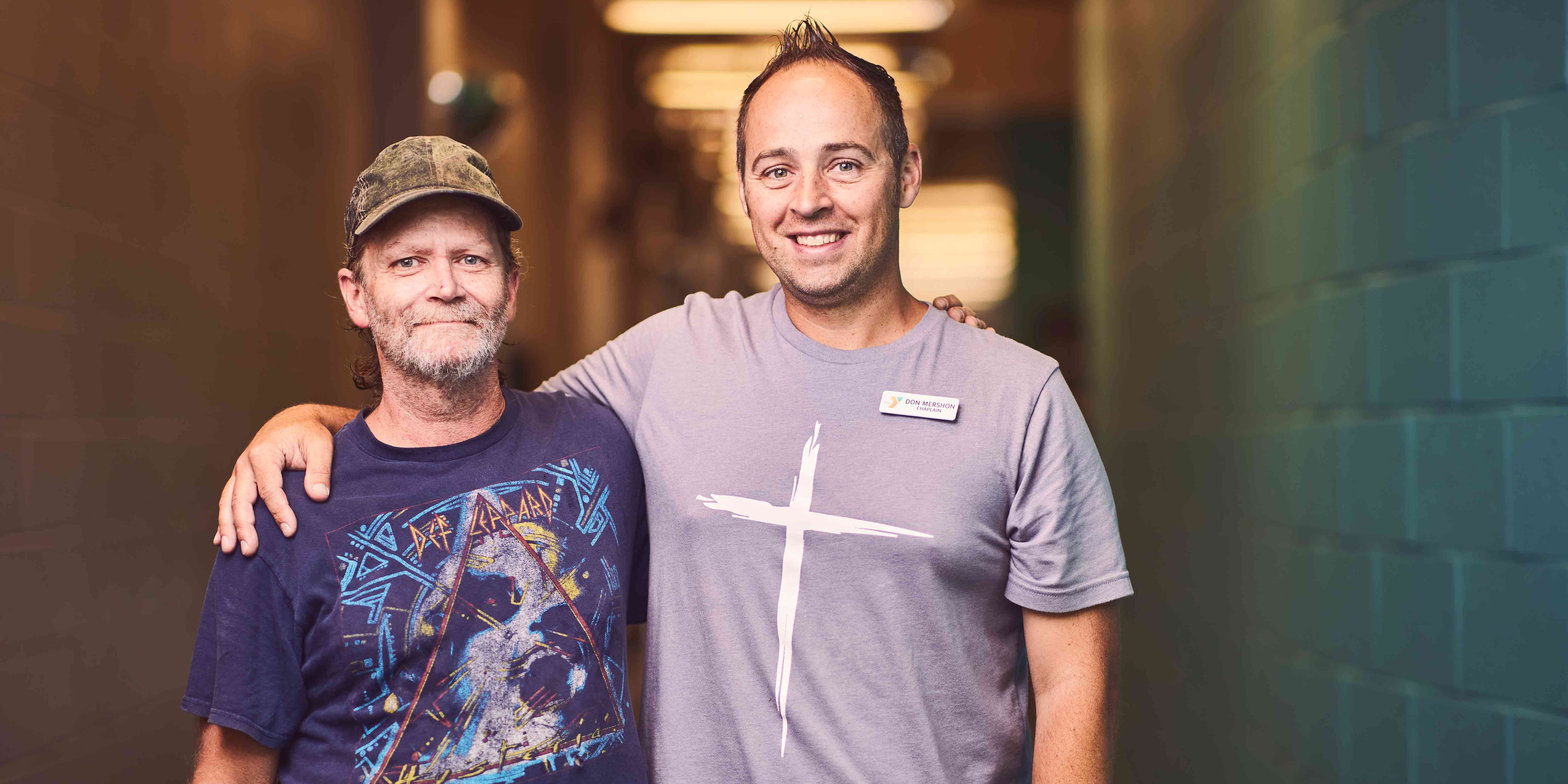 Indoor photo of senior and volunteer